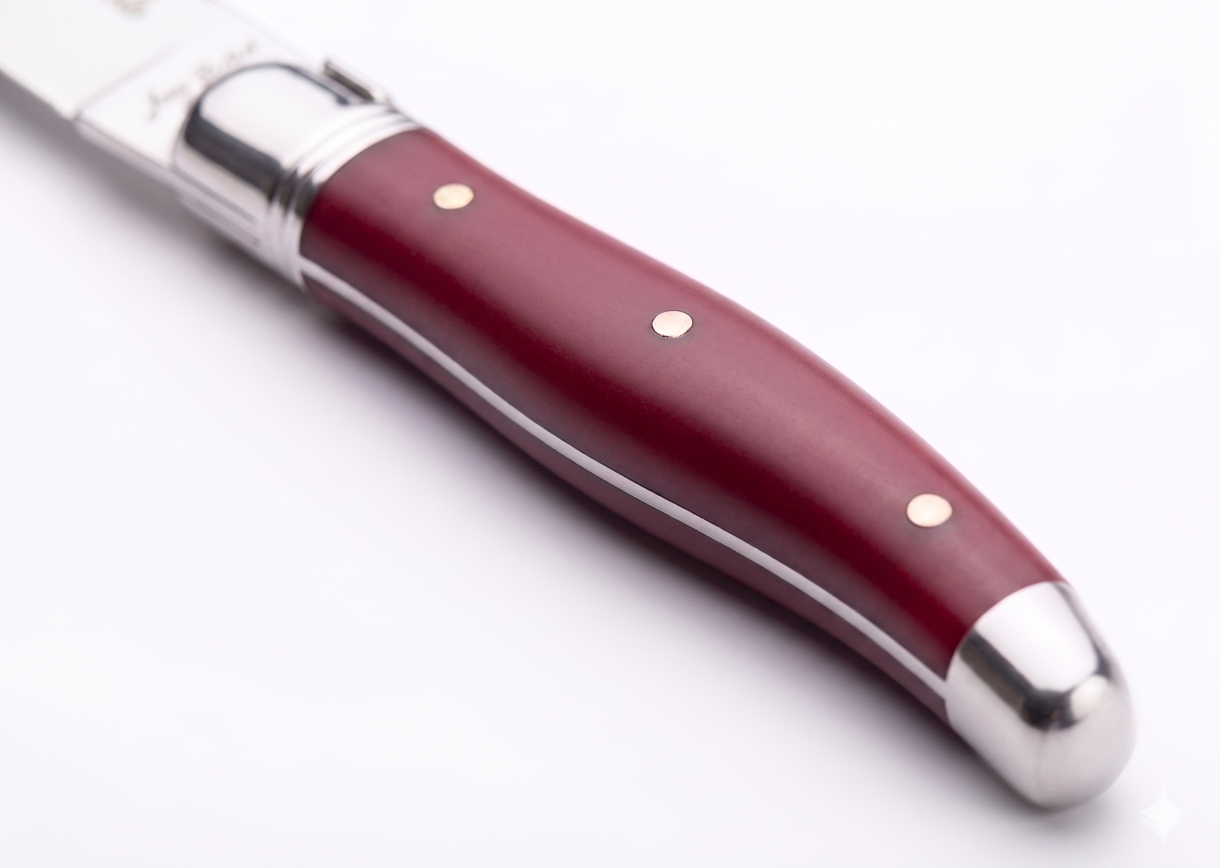Jean Dubost Laguiole Burgundy Red Resin Handle Detail — GEM de France New Orleans